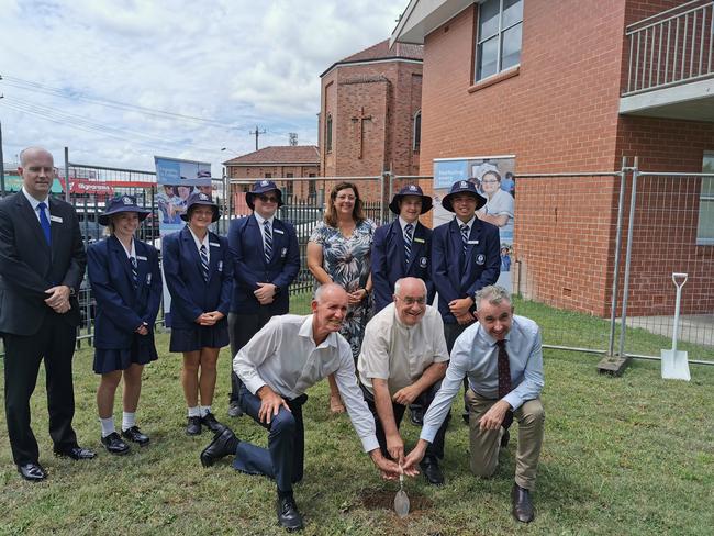 Back row L to R: Aaron Beach (former Principal), Liberty James, Kaitlin Walker, Jackon Whiton, Principal Tracy Robinson, Kalen Olive, Shane RosolenFront L to R: Casino Mayor Robert Mustow, Fr Peter Slack, Kevin Hogan MP. (Credit: Adam Daunt)