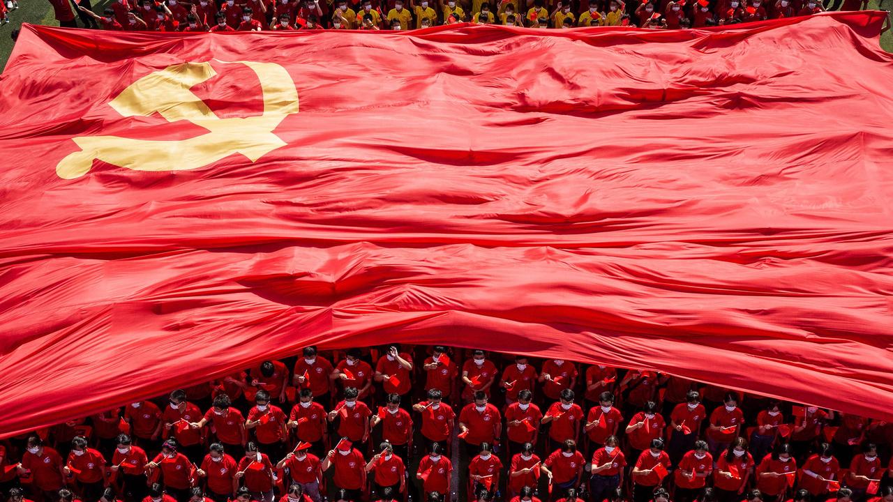 Wuhan university students honour 100 years of the Communist Party at an event in September, 2021. Picture: STR / AFP