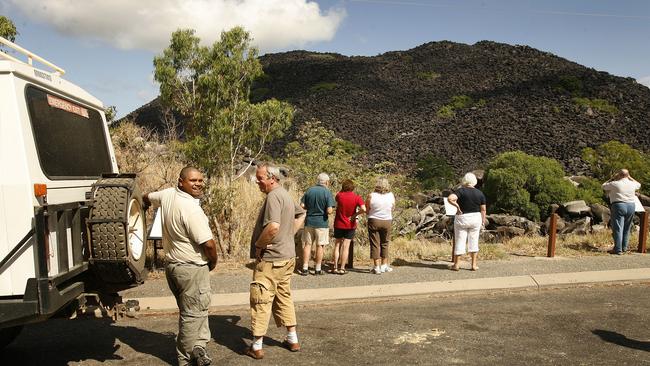 Tour guide Sidney Mooka, with a tour group at Black Mountain, South of Cooktown. Picture: Eddie Safarik.