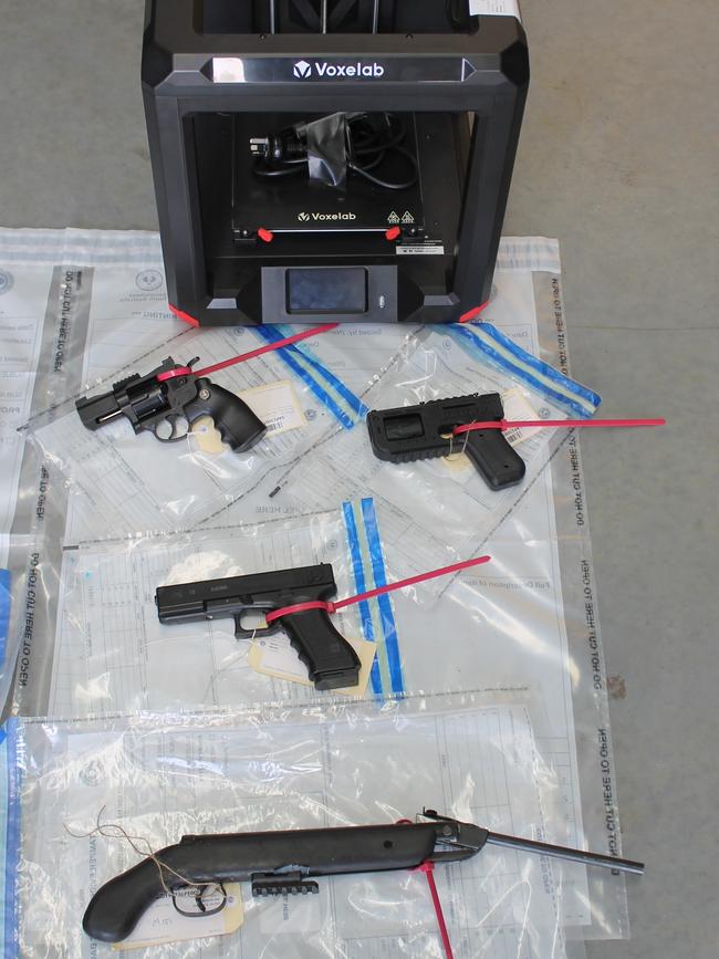 The 3d printer and firearms, found during the raid of a Morphett Vale home on August 3. Picture: SA Police