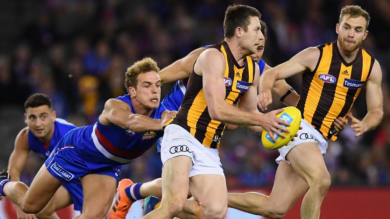 Mitch Wallis tackles Liam Shiels. Photo: Quinn Rooney/Getty Images