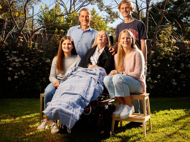 Anna and Scott Penhall with their three children Matthew 18, Mia 12 and Kirsty 20 at their home in Fullarton on July 15, 2020. Anna 49, has MND and is in a wheelchair virtually unable to communicate from this terminal disease. Picture Matt Turner.