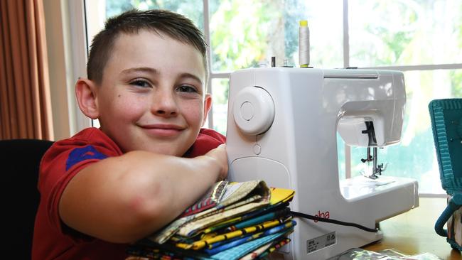 Angus Copelin-Walters, 10, has spent the lock down learning how to sew in order to make coasters and walking frame bags for the elderly. Picture: Katrina Bridgeford.