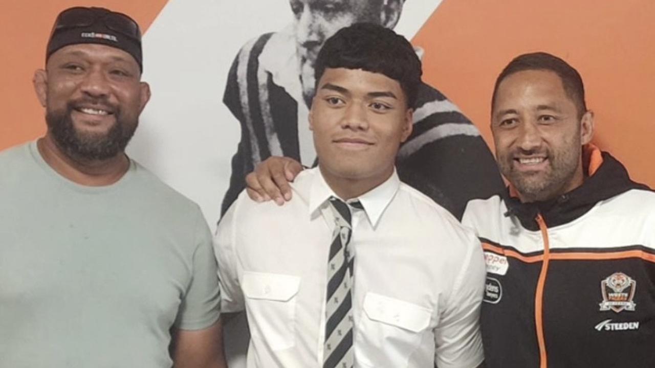 Heamasi Makasini (centre) with his father Mosese (left) and Tigers coach Benji Marshall (right). Picture: Instagram