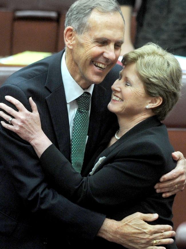 Then Greens leader Bob Brown hugs Christine Milne after the carbon tax legislation was passed in the Senate in Canberra in 2011. Picture: AAP