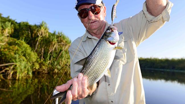 Dick Eussen with one of many Corroboree tarpon teeming in the big lagoon this year.