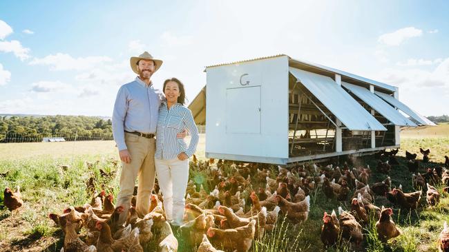 Kelvin and Kumi Slade run Willow-Zen Free Range Eggs with five flocks of 700 chooks each, housed in mobile solar-powered caravans. Picture: Chloe Smith