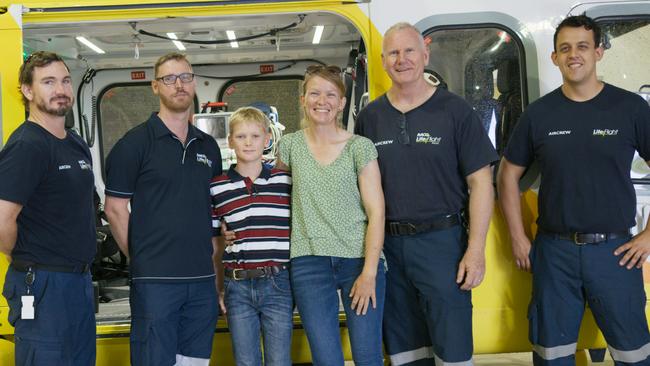 From left to right: RACQ LifeFlight Co-Pilot Nick McDonald, RACQ LifeFlight Critical Care Doctor David Wedgwood, Cooper Prior, Helen Prior (Cooper's mother), RACQ LifeFlight Pilot David Hampshire, RACQ LifeFlight Co-Pilot Andrew Caldwell. Picture: LifeFlight