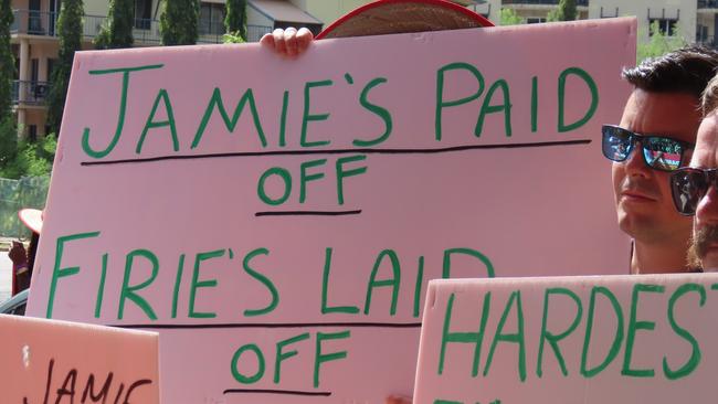 Fireys protested against the settlement between their chief executive Jamie Chalker and the NT government at the Unions NT May Day March in Darwin on May 1, 2023. Picture: Annabel Bowles