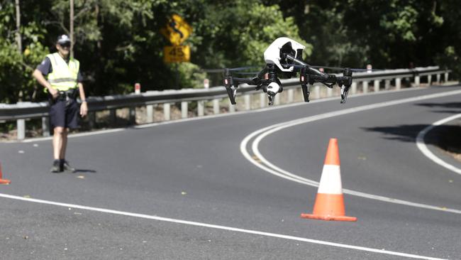 Drones will fly over roads and feed live information to drivers to help them navigate around congested areas. Picture: Anna Rogers