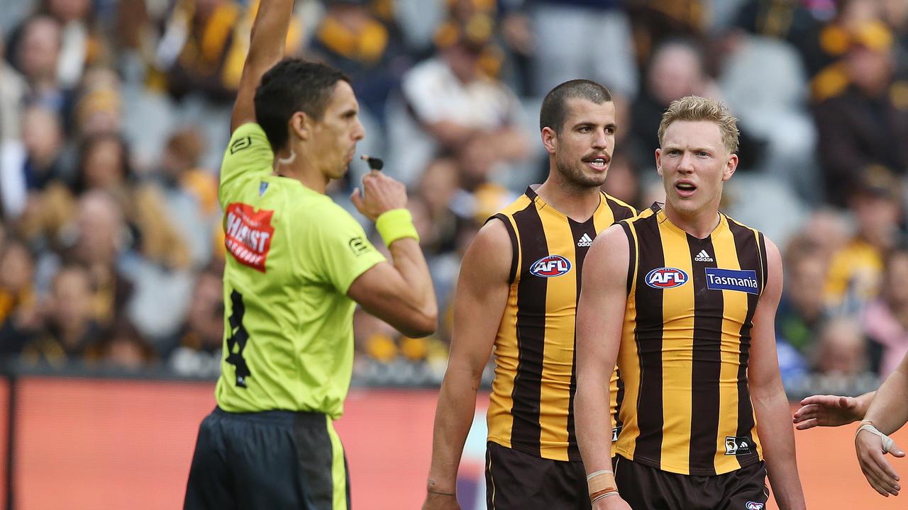 AFL. Round 3. 31/03/2019. Hawthorn vs Western Bulldogs at the MCG. Hawthorns James Sicily looks at umpire Justin Power after a free kick was paid to Bulldog Josh Schache 25 mtr out late in the last qtr . Pic: Michael Klein.