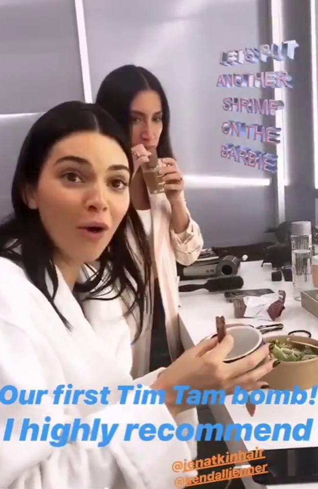 Jenner takes to Instagram to publicise the delights of a Tim Tam slam. 