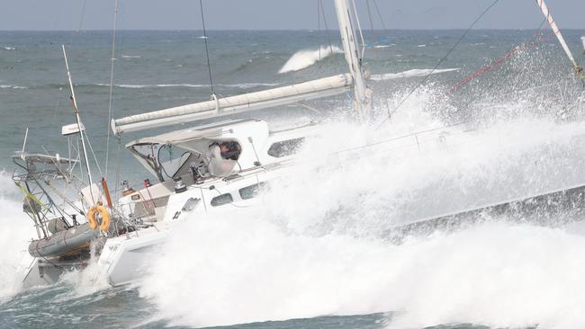 The skipper of Phantasia encounters some rough seas at the Gold Coast Seaway near where a boat capsized earlier on Wednesday. Picture: Glenn Hampson.