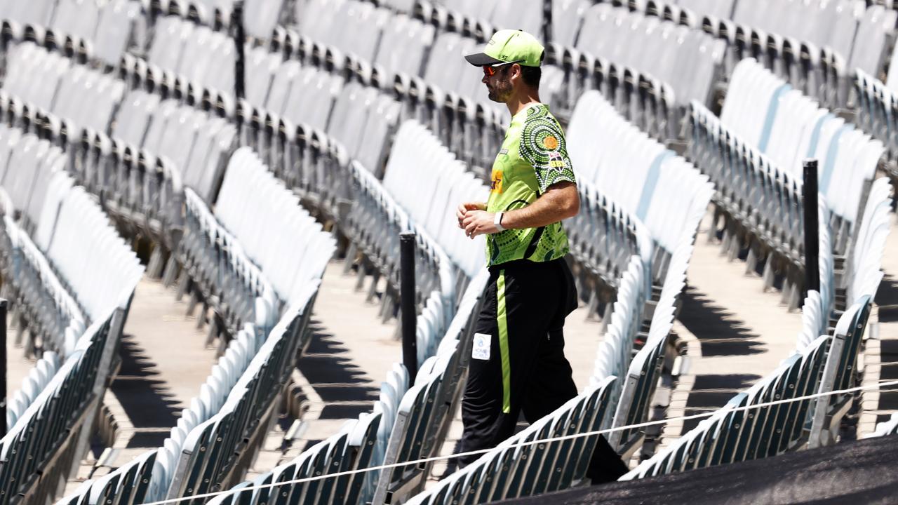 Ben Cutting of the Thunder retrieves the ball from the empty Great Southern Stand at the MCG (Photo by Darrian Traynor/Getty Images)