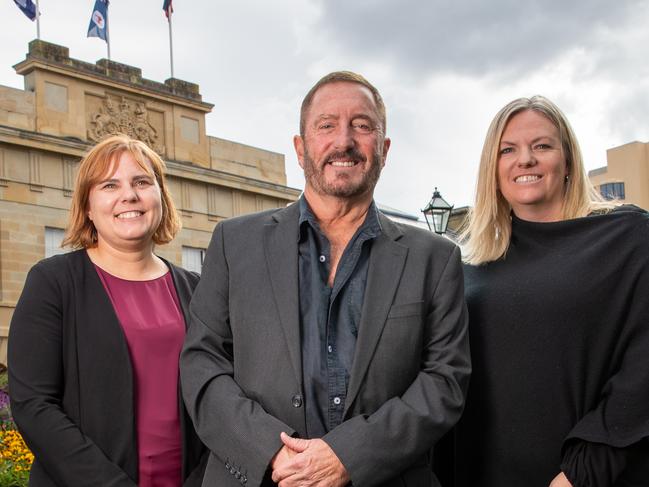 Newly elected members of Tasmanian Parliament, Member for Braddon Miriam Beswick, Member for Lyons Andrew Jenner, and Member for Bass, Rebekah Pentland of the Jacqui Lambie network at Parliament Lawns, Hobart, Monday, April 8, 2024. Picture: Linda Higginson