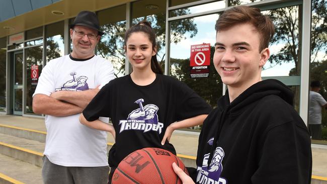 Mitcham Thunder Basketball Club’s Simon Owens with players Felicity Lloyd-Owens and Jack Walker. Picture: Chris Eastman