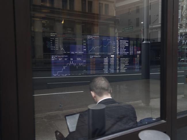 SYDNEY, AUSTRALIA - JUNE 12: Screens are reflected in a window of the Australian Stock Exchange on June 12, 2020 in Sydney, Australia. The ASX 200 has dropped 3.5% after Wall Street recorded its worst day in three months overnight. All three major US stock indexes lost well over 5 per cent, posting their worst one-day percentage drops since March 16. (Photo by Ryan Pierse/Getty Images)