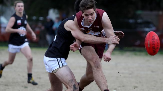 Padbury gets a kick away for the Pioneers in 2018.