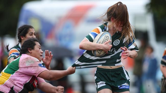 Warringah Ratette Shenai Lendell lets her hair down in the semi-final against Campbellown. Picture; Julian Andrews.