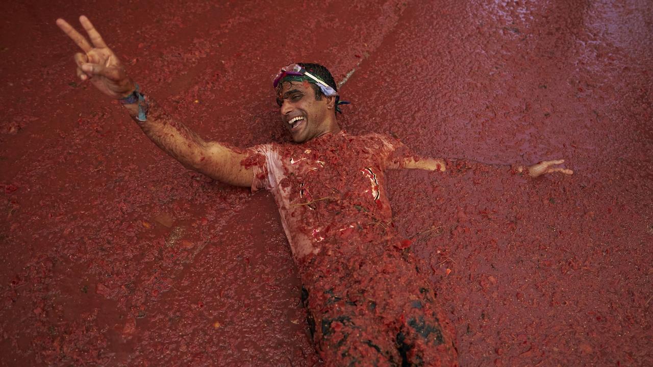 After the hour-long food fight, festivities include concerts and contests which last into the night. Picture: Manuel Queimadelos Alonso/Getty Images