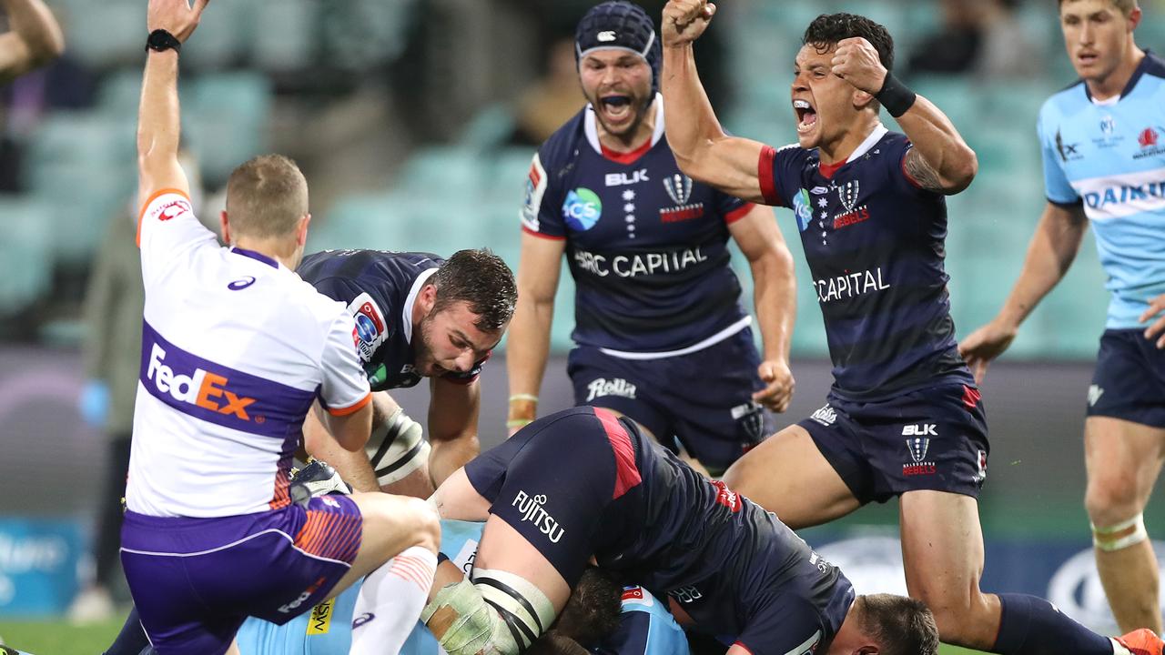 Matt Toomua of the Rebels showing how he wants to be feeling on Saturday afternoon. (Photo by Mark Kolbe/Getty Images)