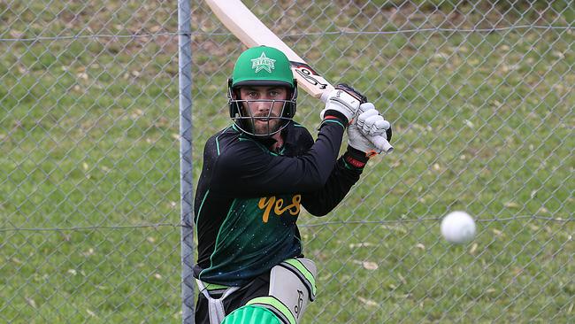 Melbourne Stars batsman Glenn Maxwell demonstrates how to perfect the reverse sweep. Picture: Ian Currie