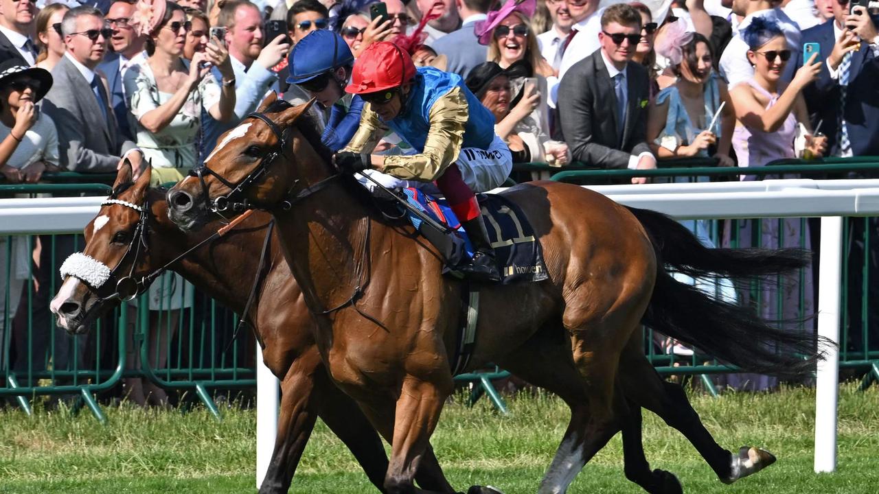 Frankie Dettori (red cap) gets Courage Mon Ami over the top of Coltrane in the Ascot Gold Cup. Picture: Justin Tallis–AFP
