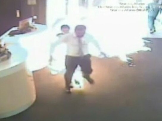 CCTV footage shows Nur Islam set himself on fire inside the bank.