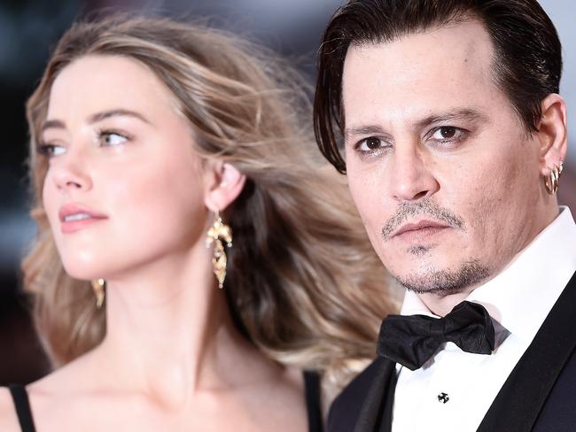 FILE PHOTO: Johnny Depp loses his libel case against the Sun newspaper VENICE, ITALY - SEPTEMBER 04:  Johnny Depp and Amber Heard attend a premiere for 'Black Mass' during the 72nd Venice Film Festival at  on September 4, 2015 in Venice, Italy.  (Photo by Ian Gavan/Getty Images)