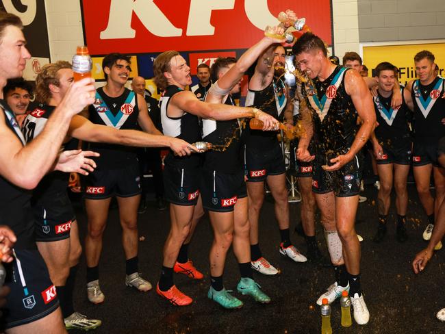 Jordon Sweet enjoys his first win as a Port player. Picture: James Elsby/AFL Photos via Getty Images