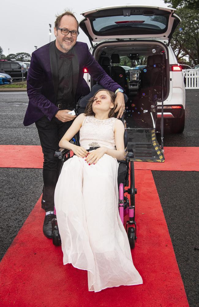 Graduate Chloe Hitzke with dad Nathan Hitzke at Clifford Park Special School formal at Clifford Park Racecourse, Wednesday, November 20, 2024. Picture: Kevin Farmer