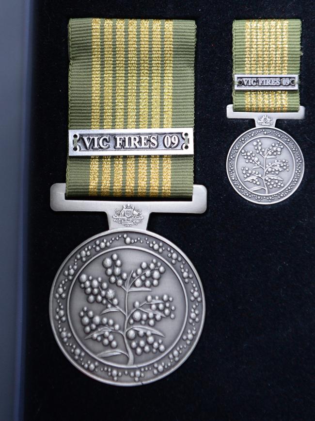 An example of what the National Emergency Medal, to be awarded to firefighters, looks like. Picture: Lawrence Pinder