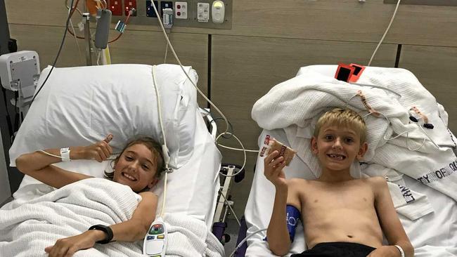 Ruby and Roman Carmody in hospital after the crash. Picture: Contributed