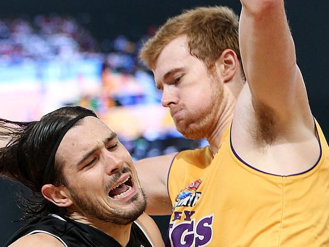 NBL.Melbourne United v Sydney Kings at Hisense Arena in Melbourne.Melbourne shooting guard Chris Goulding is blocked by Sydney Kings forward Tom Garlepp.Picture:Ian Currie