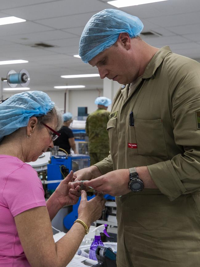 Corporal Sander Vloothuis with Med-Con employee Lynn Stockwell.