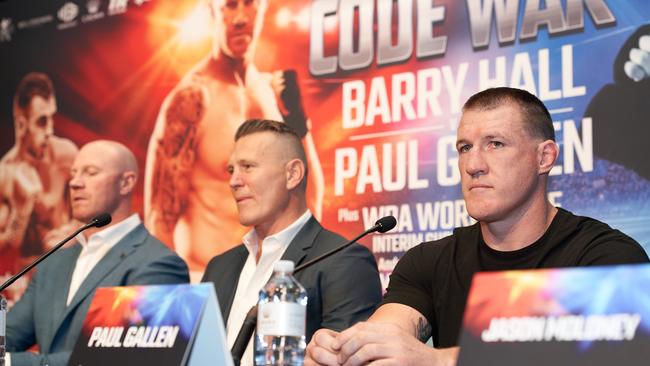 Former AFL player Barry Hall, Australian boxer Danny Green and NRL Cronulla-Sutherland Sharks player Paul Gallen during a Code War boxing launch. Picture: AAP Image/Stefan Postles