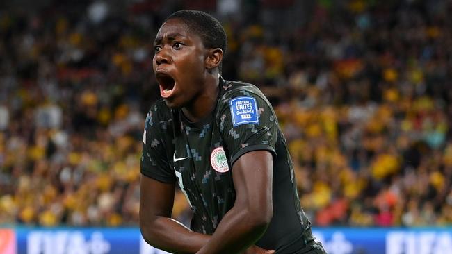 Nigerian Asisat Oshoala celebrates after scoring her team's third goal on Thursday. Picture: Getty Images