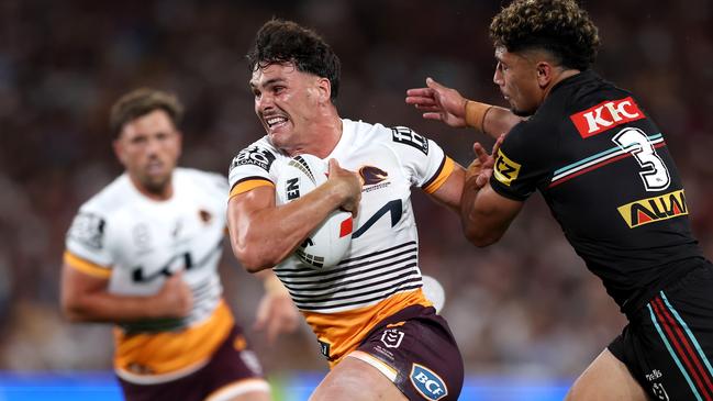 SYDNEY, AUSTRALIA - OCTOBER 01:  Herbie Farnworth of the Broncos is tackled during the 2023 NRL Grand Final match between Penrith Panthers and Brisbane Broncos at Accor Stadium on October 01, 2023 in Sydney, Australia. (Photo by Matt King/Getty Images)