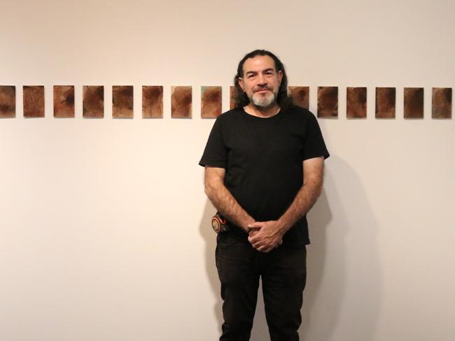 Khaled Sabsabi with his works at Mosman Art Gallery