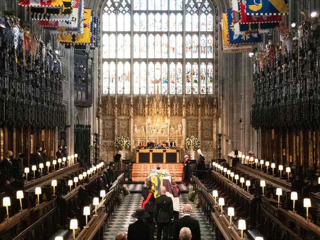 The coffin is carried into The Quire during the funeral service of Prince Philip, Duke of Edinburgh inside St George's Chapel in Windsor Castle. Picture: Barnaby Fowler/POOL/AFP