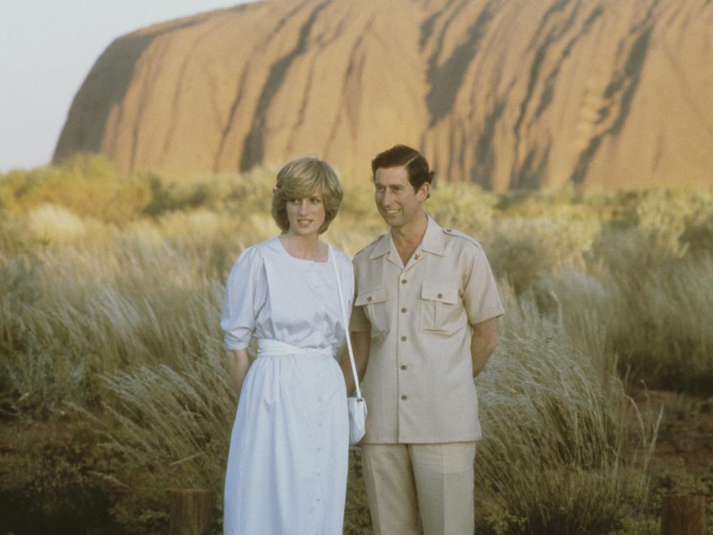 Prince Charles and Princess Diana pictured in front of Uluru during their famous 1983 Australian tour. Picture: Getty Images