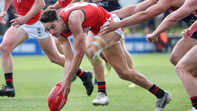 Bruno Laguda pounces on the loose ball for Essendon. Picture: Ian Currie