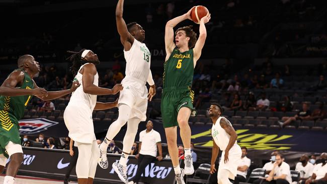 LAS VEGAS, NV - JULY 13: Josh Giddey #6 of the Australia Men's National Team passes the ball against the Nigeria Men's National Team on July 13, 2021 Michelob ULTRA Arena in Las Vegas, Nevada. NOTE TO USER: User expressly acknowledges and agrees that, by downloading and or using this Photograph, user is consenting to the terms and conditions of the Getty Images License Agreement. Mandatory Copyright Notice: Copyright 2021 NBAE (Photo by Stephen Gosling/NBAE via Getty Images)