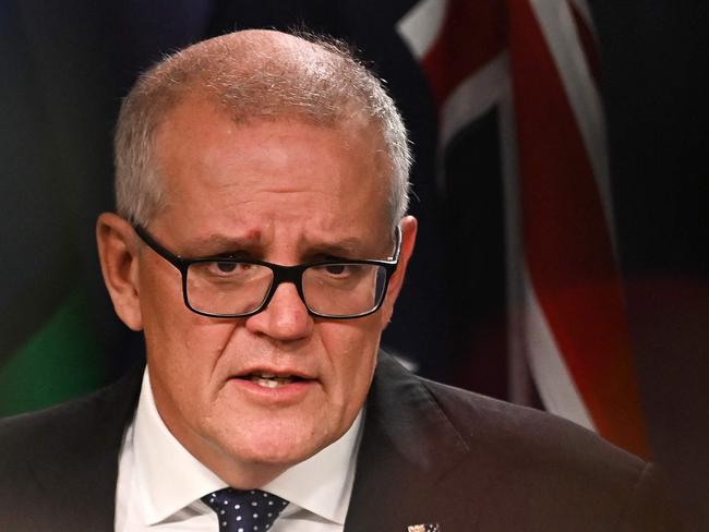 Australia's former prime minister Scott Morrison speaks to media during a press conference in Sydney on August 17, 2022. - Australia's Prime Minister Anthony Albanese on August 16 said that his predecessor Scott Morrison secretly seized control of five ministerial posts, labelling it an "unprecedented trashing of our democracy". (Photo by Steven Saphore / AFP)