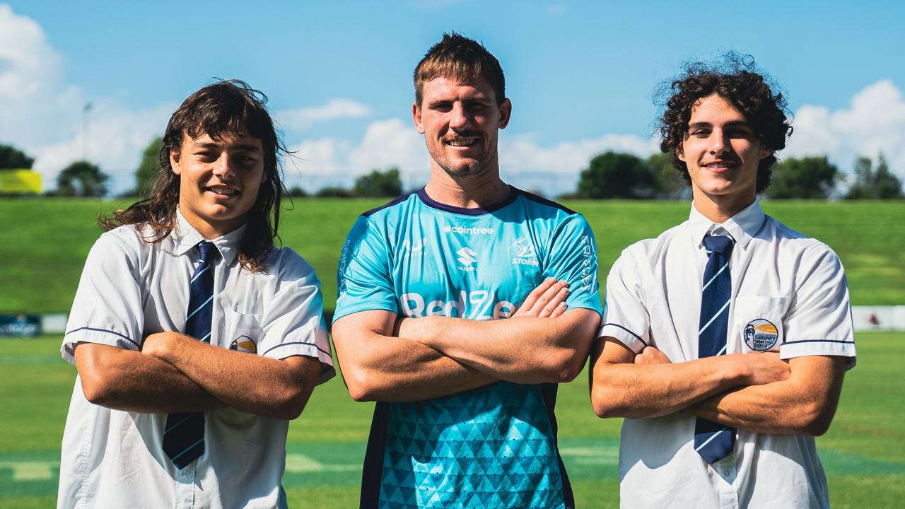 Storm NRL squad member and former Caloundra High School history teacher Chris Lewis (middle) with Caloundra High year 11 students Chase Paterson (left) and Tully McLellan. Picture: Supplied.