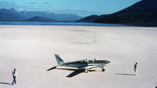 One of the iconic Tasmanian wild places people thought was worth fight for was Lake Pedder. Pedder is seen here before it was flooded in February 1972, with Ann Milledge, left, in the foreground. Picture: Chris Eden