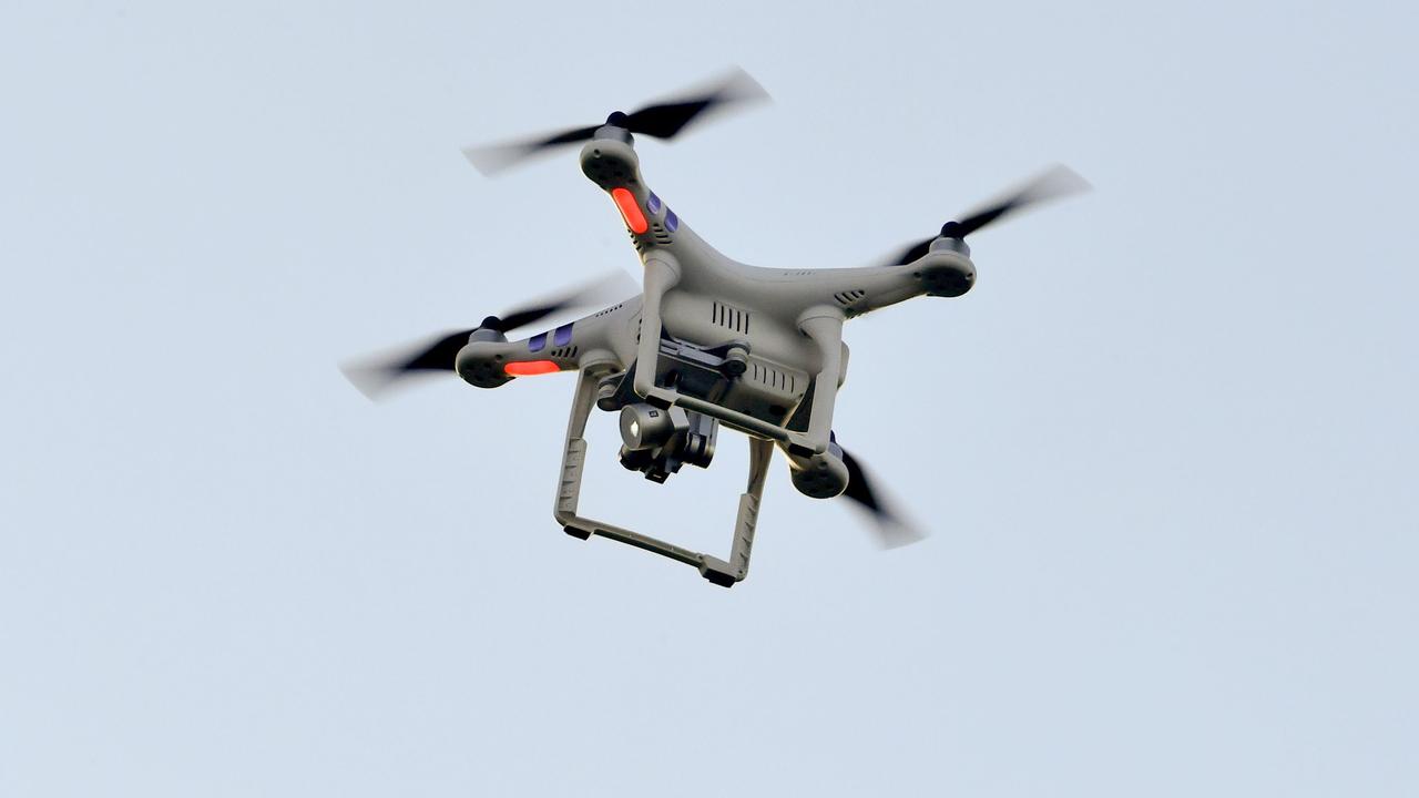 Drones can be a concern but you shouldn’t shoot them, according to police. Picture: Nicolas Tucat / AFP