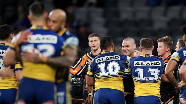 Parramatta's Ryan Matterson (foreground, No. 12) after being knocked out by Russell Packer. Matterson is set to return this week. Picture: Phil Hillyard