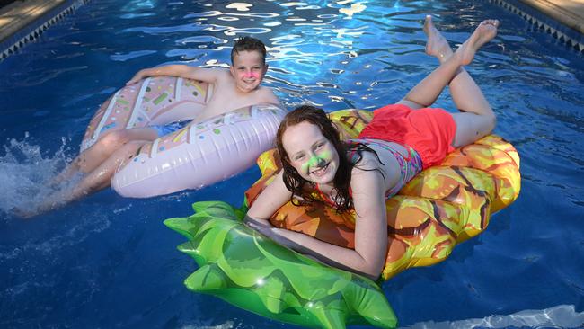 Fynn and Maya cool off in the pool. Picture: Keryn Stevens