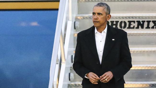 Obama will take a holiday first, then start an autobiography. Picture: Gary McCullough/AP